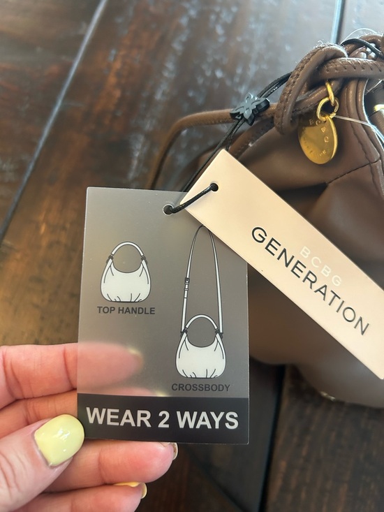 NWT BCBGeneration Chocolate Faux Leather Metal Handle Hobo
Shoulder Bag. - Picture 3 of 7